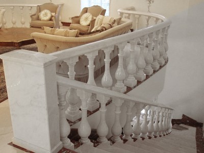 white marble staircase and marble balustrade